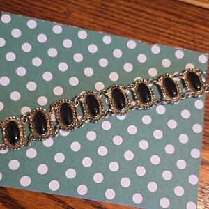 Elegant Black and Goldtone Women's Bracelet